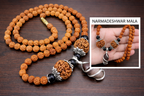 Buy original 5 Mukhi Rudraksha Mala with natural Narmadeshwar Shivling pendant. Perfect for meditation, peace, and daily wear. Authentic spiritual jewelry by Braj Mantra.